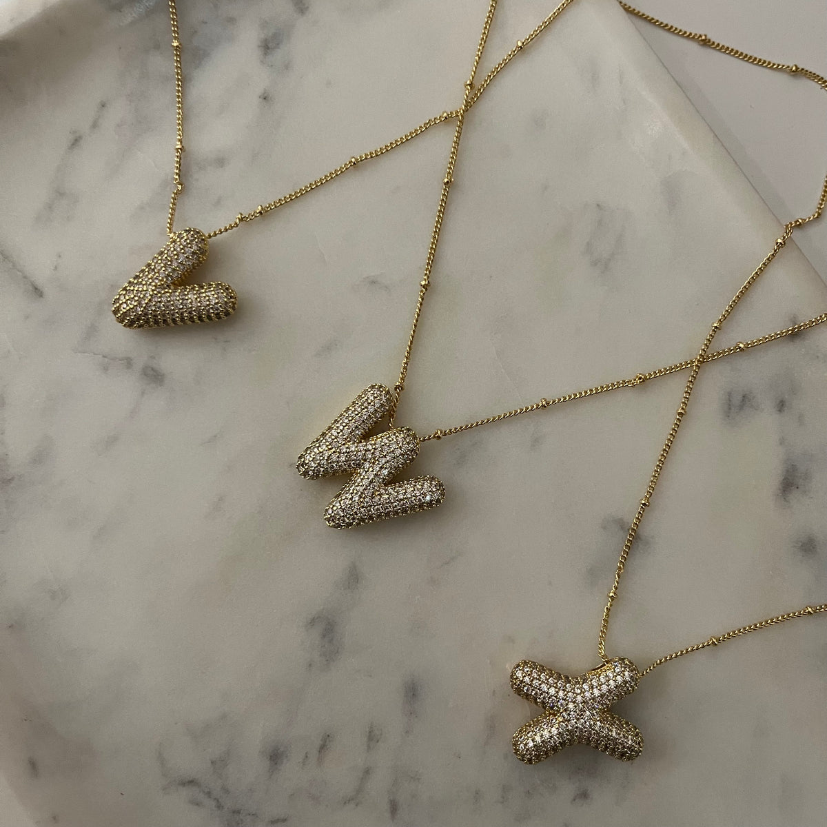 " V " letter stone studded chain