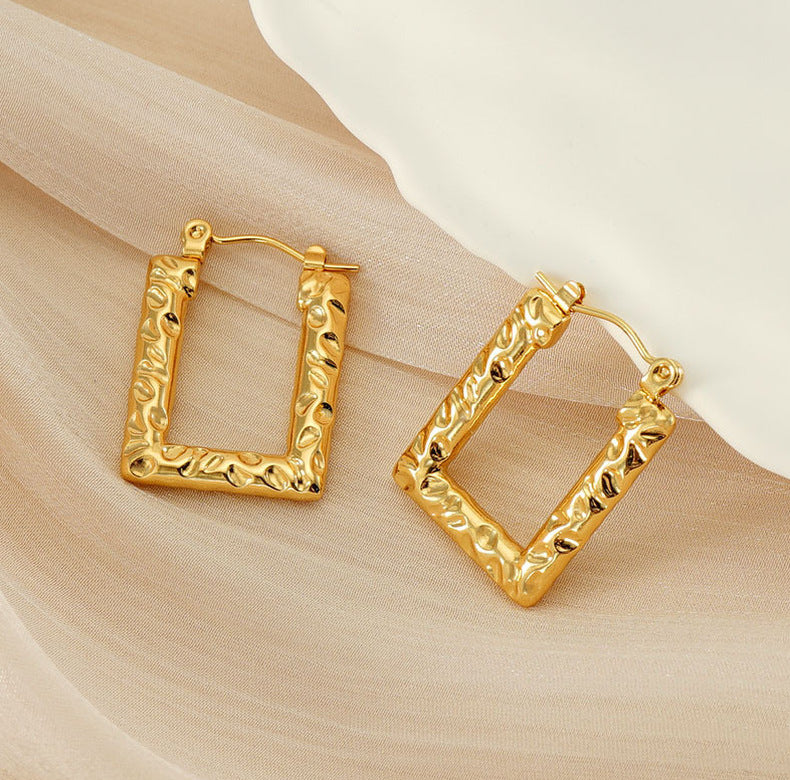 Geometrical hoops earrings