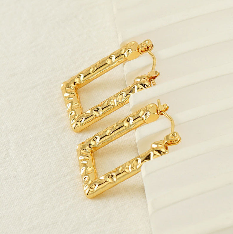 Geometrical hoops earrings