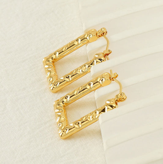 Geometrical hoops earrings